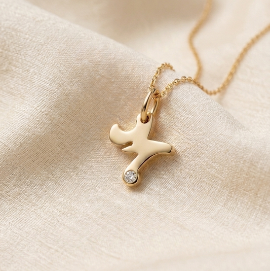 Inicial en oro 18k